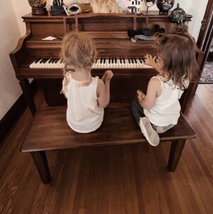 Mikey Way Instagram - My grandmother’s piano getting love from my girls ❤️🎹