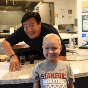 Ming Tsai Instagram - My next Cooking Live event with @familyreach is tomorrow, and I can’t help but take a stroll through memory lane and remember why I got started with such a great non-profit.

In 2010, my journey with Family Reach began when Executive Director Carla Tardif introduced me to Darlene, a young woman dying of osteosarcoma. One of Darlene’s last wishes was to come to Blue Ginger and eat a meal I cooked for her and her family. Without hesitation, I said yes. Fulfilling Darlene’s wish for a meal at Blue Ginger with her family and seeing the joy it brought them amidst their struggles was beyond moving.

Shortly after, Carla shared Raquel and Mikalo’s story. When Raquel’s son was diagnosed with cancer, she made the difficult decision to leave her job and support him through his treatment. As expenses piled up, they were eventually compelled to seek shelter in a homeless facility, where Mikalo continued his chemotherapy. The doctor emphasized the necessity of a bone marrow transplant for Mikalo’s survival. However, due to the shelter’s conditions, the procedure couldn’t be performed safely without a sterile environment post-transplant. Family Reach immediately stepped in, got them out of the homeless shelter and into their own apartment. Upon hearing this story, I knew I had to get involved and help beyond cooking a nice meal for families in the restaurant. That was 14 years ago and I haven’t looked back since.

Help me help @familyreach make a difference in so many families’ lives. Click the link in my bio to donate to Family Reach to help me reach my goal of raising $12 million! #dogood