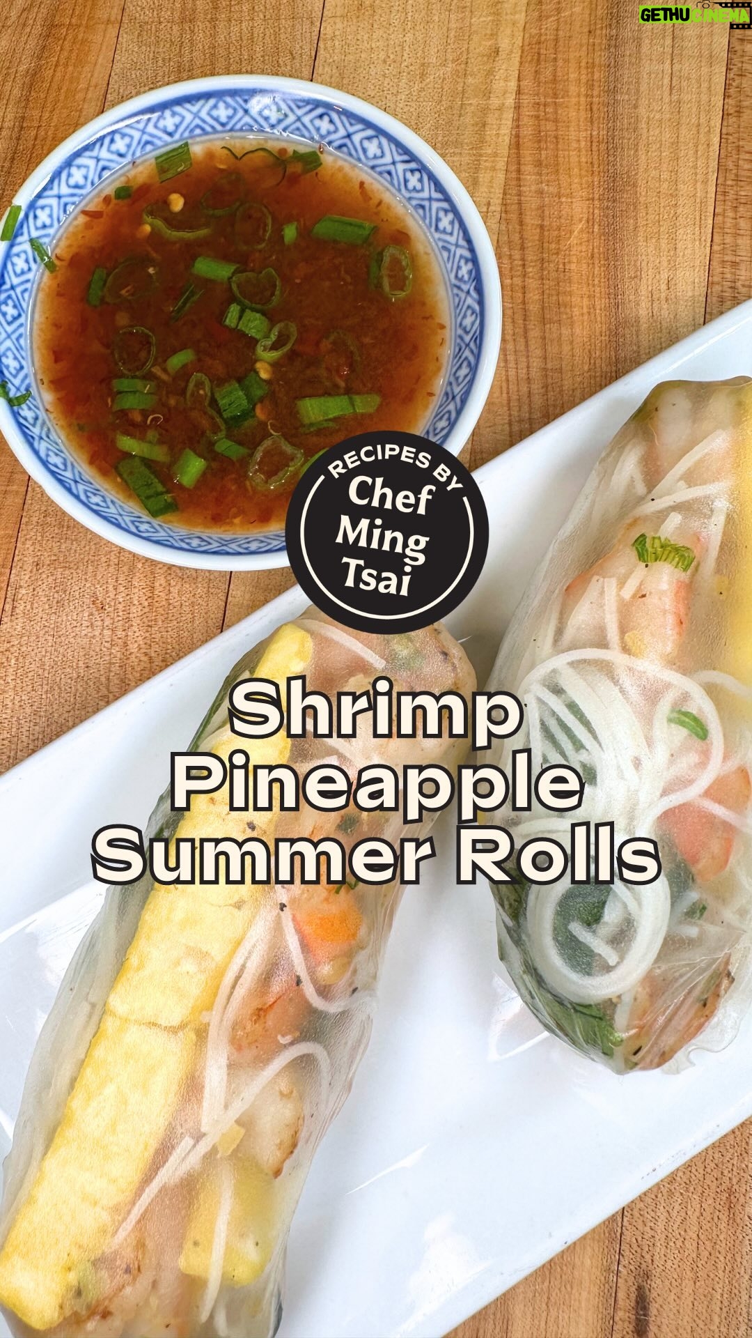 Ming Tsai - 2.5K Likes - Start getting ready for summer with Chef @Mingtsai’s Shrimp Pineapple Summer Rolls! ☀️
INGREDIENTS
1 package vermicelli rice noodles
1 pound small shrimp, deveined/shells and tails removed
2 tbsp garlic, minced
2 tbsp ginger, minced
4 scallions, green and white slice and separated
½ lime, juiced
1 tbsp fish sauce
¼ cup thai basil, hand ripped
1/2 pineapple, cut into 4” x ¼” spears
1 package Bahn Trang rice paper spring roll wrappers
3 tbsp neutral oil, like grapeseed
2 tsp olive oil
Kosher salt and freshly ground pepper
INSTRUCTIONS
1) Add rice vermicelli to a large bowl and cover with boiling water. Let sit to soften.
2) Meanwhile, heat a non-stick skillet on medium-high heat, add 3 tbsp of neutral oil to the pan. Once hot add garlic, ginger, and 2 tbsp scallion whites. Cook, stirring constantly for 2 minutes. Season with S&P.
3) Add 2 tsp of olive oil to the pan and add shrimp in an even layer. Season with S&P, cook 1-2 minutes until shrimp start to turn pink. Flip over and let shrimp cook for about 2-3 more minutes until they are pink throughout. Remove from heat and place them in a bowl, allowing them to come to room temperature.
4) Strain noodles. Add back to a separate bowl, and let this come to room temperature. Once cooled, use kitchen shears to cut the noodles to break up the long pieces. Add thai basil, lime juice, fish sauce, and 2 tbsp of scallion greens.
ROLLING INSTRUCTIONS
1) Fill a large bowl with hot tap water about ⅔ of the way up. Dip wrapper in water and allow to get malleable (about 30 seconds).
2) Take the wrapper out of the water and lay it on a clean dish cloth. Line up ¼ cup of noodles along the bottom edge of the wrapper, place 2 spears on either side of the noodles. Then add 3-4 shrimp on top of the noodles.
3) Fold the bottom edge over the filling and pull back towards you. Roll it on itself and fold in the edges. Continue to roll until you reach the other edge.
DIPPING SAUCE
Dipping Sauce Ingredient list
½ lime, juiced
2 tsp Sambal Oelek Fresh Ground Chili Paste
1 tsp fish sauce
1 tbsp scallion greens, sliced
Dipping Sauce Instructions
1) Mix everything together. Dip your spring rolls in the sauce and Enjoy!