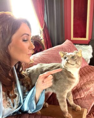 Miranda Frigon Instagram - So excited to finally share these disturbingly creepy pics of me and my co-star - a taxidermied emotional support cat named “Pernell” (who smelled a lot like a goat 🫢😩) Catch us on the new VC Andrew’s limited series “DAWN” - premiering tomorrow July 8th on Lifetime!  #lifetime #dawnseries #vcandrews #vcandrewsdawn #stuffedcat
