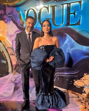 Mohamed Faraag Instagram - He’s the Prince Charming to this Mermaid 🧜🏻‍♀️🧿

We had a ball at the Vogue Ball ✨

Thank you @voguearabia @mrarnaut for having us 🫶🏼

Look curated by @dimaayad 
HER 
  Dress @dimaayad 
  Jewelry @begumkhan 
  Shoes @prada 
  Makeup @rehamkhalifaa @charlottetilburyarabia 
  Hair @rosannagracehair 
 

HIM
  Full look @dior 
  Brooch @begumkhan 

PR @daccomms 
📸 @dazlproduction