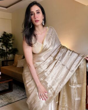 Namita Dubey Instagram - Far and few Golden moments✨
Saree by @sacredweaves