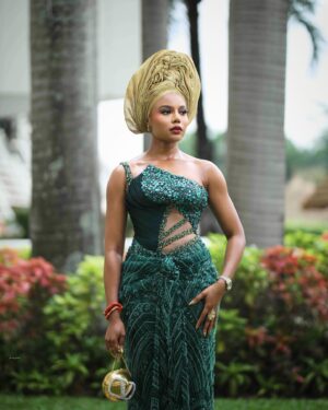 Nancy Isime Instagram - Bridesmaid of the Most Gorgeous Bride💚

#LoveUnitesUS24
#CrazyAboutUS24 

Dress: @oobiuku 
Gele: @chygele 
Makeup: @jideofstola 
Photographed by: @kennedyamaku for @bighstudios 
Video: @georgeokoro