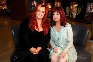 Naomi Judd Instagram - I think The Judds: Dream Chasers exhibit at the Country Music Hall of Fame and Museum is remarkable and reminds everyone to hold onto moments from their own life. We live in such a digital age, but report cards, handwritten notes and awards, even if it's a sports trophy from school, are important to hold onto. It's our history. Our lives were changed forever when we signed to RCA Records and we're incredibly thankful for the Hall of Fame to tell our story through these items.