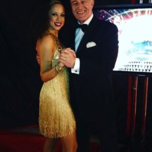 Natalie Gumede Instagram - What sad news to hear today…Len Goodman was one of the people who defined my time on Strictly ten years ago. OLD SKOOL - he was a stickler for technique, and because of that, he was the only judge I really wanted to impress every week. He sometimes clashed professionally with my dance partner over choreography, but that really spoke to Len’s passion for the traditions of ballroom dance - he knew more than any of us could dream of learning. The feedback I got from Len was sometimes mixed, but he championed me towards the end, and I deeply respected him. This (admittedly grainy) photo was taken backstage at the live tour, after he collared me to discuss one of my dances from early on in the competition. He told me he had been suspicious of me throughout the TV show because of a step I had executed in my rumba - too well for week four, in his opinion. I shared how I had been drilled on that single step for four hours one Sunday afternoon, and realising the work I had put in, he nodded, smiled, winked at me and squeezed my arm - that small acknowledgment meant so much after what had been a challenging experience on the show.
His elegance elevated every room he entered, and his presence will be sorely missed. Now he gets to dance with the real stars….⭐️ #lengoodman