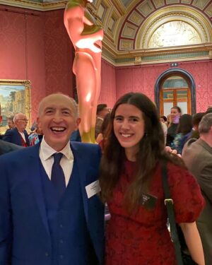 Natalie Holt Instagram - The Academy new members evening with the giant gold statues in the National Gallery.
So fun to celebrate with the generous spirit and composer friend who put me up for it; Gary Yershon and old and new pals @longstream @chrisbenstead @ulapontikos @fran_mottola @serenaarmitaggio ⭐️ thanks to @erdem for the divine dress!
