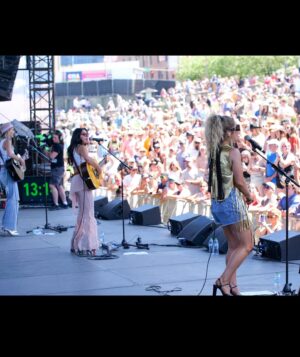 Natalie Stovall Instagram - Another #CMAFEST in the books!!! So glad we didn’t get rained out this year! Love any time that we get to meet y’all and spend time with you. Thank you for standing in the heat and packing out the Riverfront!!! 🤍💫 @cma @cmamusicfestival