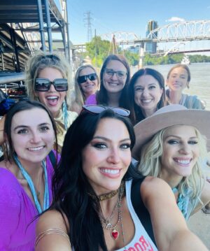 Natalie Stovall Instagram - Another #CMAFEST in the books!!! So glad we didn’t get rained out this year! Love any time that we get to meet y’all and spend time with you. Thank you for standing in the heat and packing out the Riverfront!!! 🤍💫 @cma @cmamusicfestival