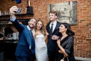 Natasha Bertrand Instagram - Married @bryancoxwell last weekend and had the best party with our family & chosen family at @bigbearcafe 🥰 

Our wedding truly would not have been as special without our supremely talented officiant and friend @dan_the_steele_man, who DEFINITELY DID NOT make me and Bryan cry at the altar with the most thoughtful and hilarious speech — Dan we love you!

thank you to the wonderful @dcbridal for the glam, @libertybakingco for our amazing cake, and @sound.originals for the photos! 🤍