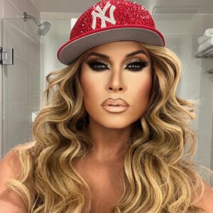 Naysha Lopez Instagram - “ Boricua in da House !! “ bitch I was feeling my @jlo fantasy in my custom hair by @full.fantasy_wigs and my custom hat by @grizzlystonework !!! You couldn’t tell me 💩 ! Lol #thebeauty #jlo #rpdralumni #allstars8 #rupaulsdragrace #dragqueen #gayboy #puertoricanbarbie #🇵🇷 #gayboy