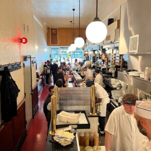 Nicholas Braun Instagram - @sandplunch is officially open for all your tuna melt/pastrami Reuben/pancake/eggs/corned beef hash/chopped liver/matzo ball soup/burger/and more, needs

Huge congrats and thanks to Matt and Eric of @courtstreetgrocers who brought this all into reality and without changing the old, classic Eisenberg’s feel. And Chef Dan Ross-Leutwyler who has made every item on the menu ridiculously good. 

Open 7 days a week, 8a-5p. 

174 5th Ave (22nd St). See you there — 🍽️☕️🥪