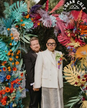 Nico Santos Instagram - Ok reposting coz some pics weren’t showing up…Wanted to share some more images that our incredible photographer @logancolephoto captured on the big day...  

My husband @zekerchief is the cutest 😍😍😍
  
A lot of y'all have been asking about my wedding look so here's the breakdown:   
  
Boutonnière: @cobralily of course! I wanted a statement and I got it!   
  
Frames: custom made by @romainkayo_eyewear! They have these lovely brass magnetic purple ombré sunglass lenses that I made good use of when the sun was blaring..  
  
Jacket: @driesvannoten that I got online for like 80% off. I've had my eye on this jacket forever (she loves a good deal henny!) but chose it because the shoulders was giving slight Filipiniana Terno vibes.   
  
Barong/Pants: custom made by the amazing @veejayfloresca! I knew I wanted an extra long barong because I wanted it to evoke bridal. And wide leg pants coz that's all I'm wearing nowadays lol   
  
Shoes: @paulsmithdesign, the first pair of tux shoes I ever bought years ago!   
  
  
But also LOOK AT THESE FIERCE QUEENS!!! @justjolopez @nebuyaystyles and @aianashaw gave us EVERYTHING and made the night even more memorable. 

🩷❤️🧡💛💚🩵💙💜🤎🖤