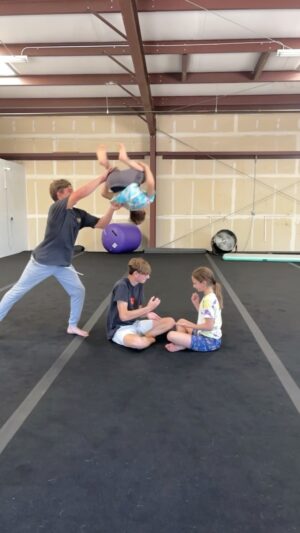 Nidal Ajib Instagram - Would you let me flip over you!?😱 
@brett_lee__ #flips#flipping#backflip#insane#viral#springfloor#cheer#tricking#gymnastics#gtramp