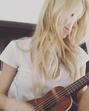 Nikki BreAnne Wells Instagram - somewhere over the #rainbow way up #high..