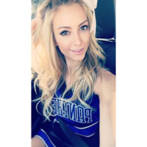 Nikki BreAnne Wells Instagram - when work puts you right back into your high school cheer uniform & you're like.. "let's go #panthers #longhorns #cheerathletics #dbupatriots #bobcats & #NCA staff, baby!" lol.. #actorlife