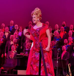 Nina West Instagram - I don’t know where to begin other than to say that I really love doing what I do. Last week I found myself in Seattle collaborating with The Seattle Men’s Chorus, and what a dream it was. Actually, this process began almost a year ago, when Artistic Director Paul Caldwell and director Rand Ringgenberg reached out to me to dream up a show together. It would be our second time working together (the first during the pandemic when the SMC presented their holiday show in a streaming version) and the show would focus on the joy and hope that drag provides to the world. The show was a hit. A bonafide hit. But aside from that, the experience was everything you could really ever hope for…

Thank you Paul, Rand, and Craig for bringing me in for this show, allowing me to share my art with you and to be so immensely impacted by the work you do. Thank you to the team of people who worked to make the magic happen and pull this show together - from Nancy, Lizzy, Kurt, Peter, Johnny, Michael, Jerbarco, Doris, Julie, Freedom, Ada,  the band, the Dream Team - Michael and Mark, and everyone behind the scenes! 

Thank you to all 200  members of this amazing arts organization for welcoming me and making me feel accepted. And thank you for making me an honorary member yesterday. I am very overwhelmed and can’t wait to work with you again. Thank you, EJ. 

Massive thanks to my friend and sister @chadmichaelsallstar for being a real one, and saying my name all those years ago to Paul and Rand and suggesting me for an opportunity like this. I won’t ever forget it. 💖

Choruses like The Seattle Men’s Chorus provide so many things to their members: Community, support, musical artistry, among many other things. I am very grateful that organizations like this one exist around the country. Please consider supporting this chorus or the amazing LGBTQIA  chorus in your city.

Thank you to everyone in Seattle for coming out and celebrating with us. I cannot wait to be back again with my friends in the @seattle.mens.chorus for another adventure and some serious community.

#seattle #seattlemenschorus #ninawest #youcantstopthedrag