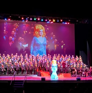 Nina West Instagram - I don’t know where to begin other than to say that I really love doing what I do. Last week I found myself in Seattle collaborating with The Seattle Men’s Chorus, and what a dream it was. Actually, this process began almost a year ago, when Artistic Director Paul Caldwell and director Rand Ringgenberg reached out to me to dream up a show together. It would be our second time working together (the first during the pandemic when the SMC presented their holiday show in a streaming version) and the show would focus on the joy and hope that drag provides to the world. The show was a hit. A bonafide hit. But aside from that, the experience was everything you could really ever hope for…

Thank you Paul, Rand, and Craig for bringing me in for this show, allowing me to share my art with you and to be so immensely impacted by the work you do. Thank you to the team of people who worked to make the magic happen and pull this show together - from Nancy, Lizzy, Kurt, Peter, Johnny, Michael, Jerbarco, Doris, Julie, Freedom, Ada,  the band, the Dream Team - Michael and Mark, and everyone behind the scenes! 

Thank you to all 200  members of this amazing arts organization for welcoming me and making me feel accepted. And thank you for making me an honorary member yesterday. I am very overwhelmed and can’t wait to work with you again. Thank you, EJ. 

Massive thanks to my friend and sister @chadmichaelsallstar for being a real one, and saying my name all those years ago to Paul and Rand and suggesting me for an opportunity like this. I won’t ever forget it. 💖

Choruses like The Seattle Men’s Chorus provide so many things to their members: Community, support, musical artistry, among many other things. I am very grateful that organizations like this one exist around the country. Please consider supporting this chorus or the amazing LGBTQIA  chorus in your city.

Thank you to everyone in Seattle for coming out and celebrating with us. I cannot wait to be back again with my friends in the @seattle.mens.chorus for another adventure and some serious community.

#seattle #seattlemenschorus #ninawest #youcantstopthedrag