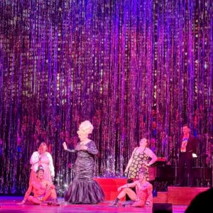 Nina West Instagram - I don’t know where to begin other than to say that I really love doing what I do. Last week I found myself in Seattle collaborating with The Seattle Men’s Chorus, and what a dream it was. Actually, this process began almost a year ago, when Artistic Director Paul Caldwell and director Rand Ringgenberg reached out to me to dream up a show together. It would be our second time working together (the first during the pandemic when the SMC presented their holiday show in a streaming version) and the show would focus on the joy and hope that drag provides to the world. The show was a hit. A bonafide hit. But aside from that, the experience was everything you could really ever hope for…

Thank you Paul, Rand, and Craig for bringing me in for this show, allowing me to share my art with you and to be so immensely impacted by the work you do. Thank you to the team of people who worked to make the magic happen and pull this show together - from Nancy, Lizzy, Kurt, Peter, Johnny, Michael, Jerbarco, Doris, Julie, Freedom, Ada,  the band, the Dream Team - Michael and Mark, and everyone behind the scenes! 

Thank you to all 200  members of this amazing arts organization for welcoming me and making me feel accepted. And thank you for making me an honorary member yesterday. I am very overwhelmed and can’t wait to work with you again. Thank you, EJ. 

Massive thanks to my friend and sister @chadmichaelsallstar for being a real one, and saying my name all those years ago to Paul and Rand and suggesting me for an opportunity like this. I won’t ever forget it. 💖

Choruses like The Seattle Men’s Chorus provide so many things to their members: Community, support, musical artistry, among many other things. I am very grateful that organizations like this one exist around the country. Please consider supporting this chorus or the amazing LGBTQIA  chorus in your city.

Thank you to everyone in Seattle for coming out and celebrating with us. I cannot wait to be back again with my friends in the @seattle.mens.chorus for another adventure and some serious community.

#seattle #seattlemenschorus #ninawest #youcantstopthedrag
