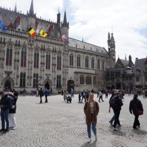Nuran Evren Şit Instagram - From Brug with Love 💙 Dark grey sky nor wind and rain could kill the joy of being in this ancient city on Our Second Anniversary. Happy Together baby🌹@barbaros_yaras #brugge #weddinganniversary #june #love