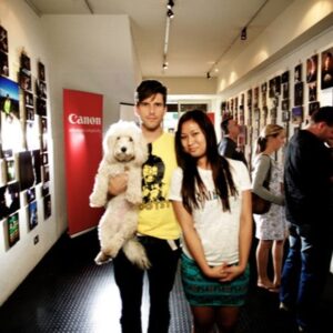 Osher Günsberg Instagram - I've known @nahaste since 2000, and she's been like a sister to me. I'd known her dog Pippet for almost as long (she is pictured here when Mel opened my first photographic exhibit at her gallery back in 2010) . 
The thing about humans is we choose companion animals that don't live as long as we do. Alas, Pippet has gone to chase squeaky balls in the sky. She was my first oodle, super good for cuddles when I stayed in the spare room and a loyal companion to my dearest Mel. I am sad for you my dear friend. My hope is that everyone throws a ball to their doggo today in honour of that lovely pup. In a world of good girls, she was the best.