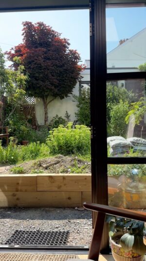 Owain Wyn Evans Instagram - Wow even the mound of soil and bags of slate in the garden look a bit nicer in this sunshine! 😂 🌳

What a stunning day ☀️ We always try to bring light and brightness into whatever home we’ve been in and whatever the weather!

A favourite here is the cutesy light tunnel in the upstairs hallway. It gives me very ahoy sailor nautical vibes and brings in so much light⛴️ 💅🏻

Next task- the garden! 
.
.
.#renovation #ukhomereno #interiordesign #interiordecor