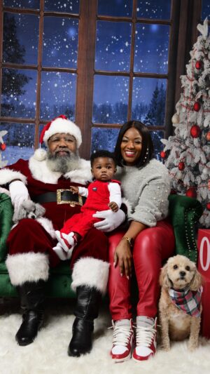 Patrice Covington Instagram - Sonphew   Black Santa   coordinated J’s = MY FAVORITE THINGS! 🎄♥️🎅🏾 I’m not 100% outta my mind y’all. @mrs_erickaaa allowed this. 😂 meanwhile Royce didn’t care one iota! 

📸 @vizinkweddings

PS run these streams up y’all! 🎶🎤