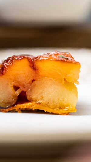 Paul Ainsworth Instagram - Our Apple Pie 🥧🍎 - inspired by my dad and my time at @restaurantgordonramsay, this take on a Tarte tatin uses Pink Lady apples, which we dry age for almost a week to bring out the incredible flavour. After baking we glaze the tart with a verjus caramel, a sprinkling of Cornish sea salt and a touch of fresh thyme. 

Served alongside my favourite blue, Barkham from @twohootsdairy and an incredible seasonal British cheese to contrast, from the incredible cheesemongers that are @nealsyarddairy. Currently Montgomery’s Cheddar!! 🧀
