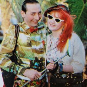 Paul Reubens Instagram - 🏌️‍♂️⛳ Throwback to 1984 when Pee-wee and Cyndi Lauper played Putt Putt together for an Entertainment Tonight segment! 🎤🎶 Fun fact: Cyndi sang the "Pee-wee's Playhouse" theme under the alias "Ellen Shaw." Why the pseudonym? She was releasing her album "True Colors" at the time and wanted to keep her more serious music separate from her playful contribution to the show! 

From her autobiography, "Cyndi Lauper: A Memoir": “In our superficial world, people couldn’t accept both at the same time. So I sang the theme song using the pseudonym ‘Ellen Shaw.’ And then Paul sent me back a tape that was so hilariously funny, of me singing the theme with him in between saying, ‘Oh no! My career is ruined, oh no!’ He’s a nut. I love him.”

#MiniatureGolfDay #PeeweeHerman #CyndiLauper #MiniGolf #EllenShaw