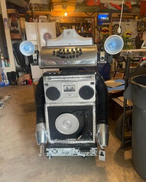 Paul Reubens Instagram - Our record player broke a few weeks ago so I decided to turn it into a life sized Conky 2000 for Etta’s Valentine’s Day! The head is a bit too big and the arms are too long, but hey for a bunch of thrift store parts I think it turned out pretty good! We also hooked in a micro SD card with all of her favorite Pee-Wee songs and sound bites. #PeeWeesPlayhouse