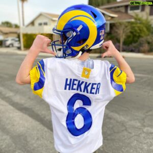 Paxton Booth Instagram - Sundays are hard without football. So here’s some pics of me in @jhekk Super Bowl helmet and jersey 🏈 Thanks Johnny for always being so rad! Go @rams 💙💛
