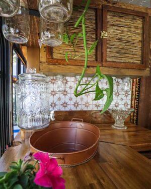 Pearl Liaison Instagram - Spent the last few months building a shuttle bus into an off-grid tiny house and we’re v happy with how she turned out 🥲💔 
Specs: 2007 Ford E450, 24ft, 175k miles, 480 watts solar   Yeti3000 battery/ 70 gallon water tank/ gravity-fed plumbing/ copper soaking tub/ heated shower/ queen bed/ 12v fridge & freezer/ 3-burner propane stovetop   oven/ convertible sofa/ full-size wardrobe, taste, glamour, etc❣️