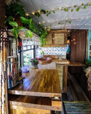 Pearl Liaison Instagram - Spent the last few months building a shuttle bus into an off-grid tiny house and we’re v happy with how she turned out 🥲💔 
Specs: 2007 Ford E450, 24ft, 175k miles, 480 watts solar   Yeti3000 battery/ 70 gallon water tank/ gravity-fed plumbing/ copper soaking tub/ heated shower/ queen bed/ 12v fridge & freezer/ 3-burner propane stovetop   oven/ convertible sofa/ full-size wardrobe, taste, glamour, etc❣️