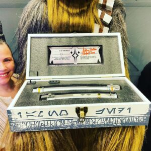 Peter Mayhew Instagram - Only two hours left!  If you’re here at @FanExpoDallas you can enter our raffle to win these Galaxy’s Edge LE Ahsoka Tano lightsabers signed by @AshleyEckstein herself!  We’ll be pulling the raffle at 2pm at our table with @501ststargarrison.