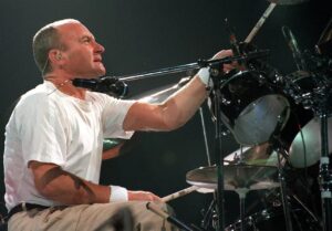 Phil Collins Instagram - Happy #WorldDrummersDay! 🥁 Do you have a favourite drum performance by Phil Collins, apart from the iconic drum fill of “In The Air Tonight”?

Photo by Bernd Settnik