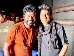 Prem Instagram - Dear #Shivanna, thank you for living your life to the fullest & inspiring us to do the same.

We are happy to invite @nimmashivarajkumar to the Title Teaser Launch event of #KVN4. You make us stronger. Stay tuned to @KvnProductions YouTube channel on 20 Oct.

@dhruva_sarjaa @suprith.ts @arjun_janya_musician @kvn.productions

#Sandalwood #Kollywood #Bollywood #Tollywood #VijaySethupathi #prems09 #KVN #KVN04 #October20th #KVNProduction #Kannada #TitleTeaser #Orionmall #makkalselvan #dhruvasarja #mumbai