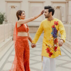 Pulkit Samrat Instagram - Hamari haldi thodi unconventional thi. Haldi ki ek chutki for Sagan in a pack of Multani mitti, created especially for pulkit and I, keeping our skin in mind coz bride and groom have to glow na. ❤️ 

P.S.  big props to the person who held me back while the others threw pulkit into the pool :) I’m grateful! ❤️
