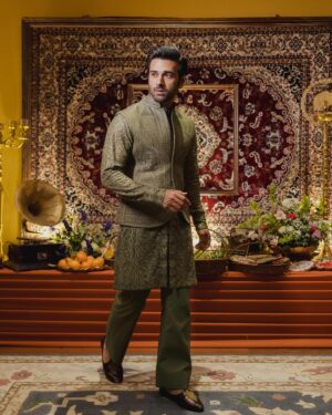 Pulkit Samrat Instagram - My journey to the altar was nothing short of a fairy tale, ignited by a single phone call to my dear friend @theanisha , which was filled with screams of excitement over the news of my upcoming wedding. Despite the absence of a set venue or date, I was unequivocally certain about one thing: my attire would be crafted by the incomparable Anamika Khanna. Our adventure began in the opulent @anamikakhanna.in Mumbai store, amidst the men’s section, but it was in the women’s section where we found our muse—a stunning piece of embroidery that captured my heart and set the theme for my wedding ensemble.

Anamika wasn’t the only magician behind my wedding wardrobe. For the Mehendi ceremony, @farazmanan was the clear choice. Despite his hectic schedule and the collection still being under development, Faraz crafted a breathtaking olive green outfit for me, allowing me to be the first to showcase his new collection. His dedication was a gift I couldn’t have been more grateful for.

As the wedding approached, the need for a Cocktail/Sangeet outfit became urgent. With just a week to spare, we were struggling to find someone who could encapsulate the essence of “shimmer” I desired. It was then that I was introduced to @rahulmishra_7 , and through the efforts of the wonderful Divya, I was adorned in an outfit that radiated shimmer and elegance, surpassing all expectations.

The Black Tie event demanded nothing less than perfection. Rohit Gandhi & Rahul Khanna were the craftsmen of choice for my tuxedo, presenting me with an array of swatches and patterns, making the selection process delightfully challenging. Surrendering to their expertise, the final piece was nothing short of spectacular, becoming one of my favorite looks. @rohitgandhirahulkhanna 

Anamika Khanna didn’t just stop with the wedding outfit; she designed my haldi and both my grah pravesh outfits, sealing my admiration for her forever.

Reflecting on my wedding journey, I’m overwhelmed with gratitude for these fashion pioneers who turned my dreams into reality. Their passion, creativity, and dedication made me the happiest groom alive. My heart is full, and wardrobe, a testament to their genius. 💓🕺