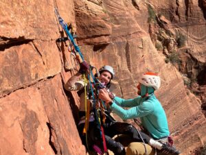 Quinn Brett Instagram - What am I doing???? 

The scene is a little different from the free climbing of 5 years ago on these sandstone walls but it was sure nice to hang up high in them again! 

Anxiety was high during our two days at times because I can’t feel if I am scraping my knees or hips or ankles and how badly I surely am. Am I sitting to long causing a pressure sore?  I did my best with knee pads, cushions and weight shifting but at times I wondered if it was worth the effort. Also. How the hell am I gonna pee and poop?  Jeesh. “What am I doing?” 

The rest was big wall type-two fun and  shenanigans—- communication, diligence to order of operations, sore body parts that haven’t been worked in ages, glorious views and amazing people. 

This wouldn’t have happened without the support, friendship and commitment of @sstratts @eeejayenn @steffangregory ❤️ 💪 🙏 💕 😊 @snakesaresmart @not_disabled and @timmyoneill @adidasterrex @blackdiamond @grade7equipment @ymcarockies @susantaylordarby 

I might have spent the last five years sitting but certainly not sitting still. Clipped and dangling to the side of a mountain, I still find this weird contentment—- it quells my insatiable need to multi-task, plan, brain chatter—- I do finally just sit. 
.
.
.
.
#2gimps1pimp #pullupsfordays 
.

.
#climbing #rockclimbing #enduranceathlete #skiing #mountains #mountainbiking #trailrunning #running #roadbiking #crossfit #yoga #paragliding #outdoors #athlete #diving #spinalcordinjury #spinalcordresearch #paralyzed #science #sports #wilderness #disability