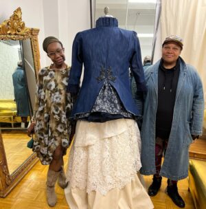 Radha Blank Instagram - OBEAH WOMAN, COME INTO THE ROOM!
A Prologue.
I’d been invited to remix a room in the #metcostumeinstitute #americanwing for their #inamerica exhibit. I integrated the dress of designer Maria Hollander, a White woman abolitionist. But when I asked who made the dress and her politically charged quilt seen in the exhibit, the seamstress remained unknown. This was chance to take #metgala invitation from a red carpet moment to a truth telling one. I would create a visual prologue to my #wegoodthx! installation. (More on the actual exhibit in the next post! I see you @hairbysusy @africancreature 😘)

I would rep a woman who could have made Hollander’s dress- an Obeah Woman who by day used her hands to sew, cook, wash White folk clothes & tend to their chirren and by night used her hands to conjure spells for our survival using ancestral African spiritual practices not meant to survive the middle passage. This would be my homage to Marie Laveau but also The Condomble Woman, The Santeria Priestess, The Ifa Woman, The Yoruba Priestess. The Voodoo Vixen and all women practitioners of ancestral arts from Africa.

This woman would represent the unseen Black women who have sewn the fabric of this country but she would also be my armor as faces and bodies like mine aren’t usually seen or celebrated in these spaces. 

Because I was invited a lil late to the party, I had less than five weeks to make something happen. The first person I called was the amazing @bevysmith, fashion and cultural writer & warrior who encouraged me to take my vision all the way. Knowing I needed a Black designer, Bevy suggested I reach out to @brandicedaniel founder of @harlemsfashionrow. Brandice being brilliant and knowing most Black designers were booked, suggested I reach out to dressmaker Jennifer McFarlane aka @jennycouture, a Jamaican American master craftswoman. When I mentioned “Obeah Woman” to Jenny, she hummed deep and I could feel her lips curling through the phone! And so with a design I co-created with my very best friend of thirty plus years @denise.trotman ….
Caption finished in post below….

(Special shout out to me & Peters assistant Chris Reyes  @crey_j for putting in that WORK!)