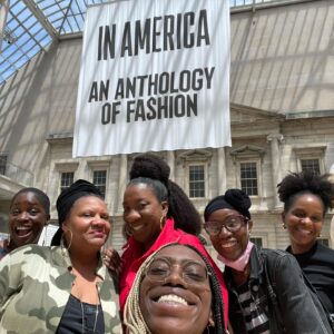 Radha Blank Instagram - And that’s a wrap on #wegoodthx for @metcostumeinstitute #inamericamet exhibit! 

Thanks to Andrew Bolton and The Met for this distinguished invitation. Thanks to all of the Met staff and artisans who helped me bring this vision to life (see previous posts) 

Dedicating THIS post to all my wonderful friends and family who always come out to support and who in this epic moment for me as an artist- (in the absence of my parents), have really become a life line. MY FRAMILY.  Love you guys! 

A very special thank you to my best friend, favorite artist, art teacher and co-conspirator, my mother #carolblank who always encouraged my big creative visions and who, (with my only having a few weeks to execute this baby) clearly planted the seed for this idea from on high! What a wonderful gift for our bday month! Thanks Mommy! We did it! 

Proud moment was to get to share this with my nieces and nephews. I hope your auntie inspires you as much as I embarrass you. 😘❤️🤣

#carolsdawta #rajasgal #carolblank #radhablank #blackwomenartists #lookma #lookmommy #twinlibras #924