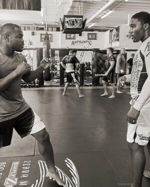 Rashad Evans Instagram - The morning of July 16, 2008, I walked into Jackson Winkeljohn MMA to meet and document Rashad Evans for a few days. His manager at the time, Jervis Cole set this up, so I had no idea what to expect as Rashad and I never talked but @GeorgesStPierre spoke so highly of him, I knew he was good people. 

Before I even set my bag down, Rashad walks up to me and says.. “Good Morning, you look a little lost. You must be Eric Williams. Welcome to the home of the Jackson 5, I’m Rashad. You met Greg, so make yourself at home as training is about to start. I’ll introduce you as we move around. You can shoot wherever, just no shoes on the mat and if you’re hungry, we’ll get some food after training’s over.”

He alternates his warm up between @GeorgesStPierre, @KeithJardine, @AliAbdelaziz, @AjarnPhilNurse, @JulesK_Fighter, @Roger_Huerta and @Mike.VanArsdale. It was so surreal because the combined level of skill in that room was insane. 

At that time I’m a year into working in MMA so I was still learning how to jump right  into a new training environment. Rashad picked up on that and he started teaching me how to move, both in the front and behind the scenes of MMA.  Along with being a phenomenal athlete, he had a leadership quality and a level of patience I had not experienced in the sport. 

He taught me how to spot championship level talent, made introductions and put me in rooms that had no doors, showed me what it was to be a great father, what traps to avoid and he’s been my big brotha’, from another mother ever since. 

I’ve documented his growth to the highest heights in his MMA career, watched him stumble, fall, take steps back and resurface better than ever and he’s always led by example. Never with an ego. 

From being the 1st UFC fighter to wear a suit to a press conference, the 1st black fighter to win the Ultimate Fighter, a UFC Light Heavyweight Champion, a FOX Sports and ESPN analyst to his physique and kick being used to create the @FightersOnly MMA Award, he’s been a trailblazer and inspiration in every respect.

I’m proud to know you and have you as a Big Brotha’ Rashad. 

Let’s keep it going.