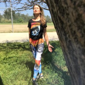 Rena Riffel Instagram - Meditating at the dog park and soaking in a little sunshine 🧘🏼‍♀️⚽️🐶 I had to wear my puppy yoga gear for the occasion. #meditation #yoga #fitness #staysafe #socialdistancing