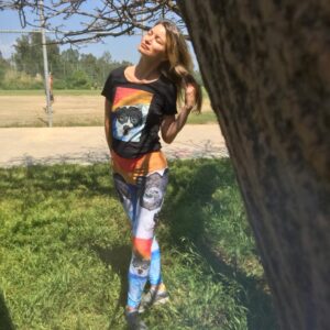 Rena Riffel Instagram - Meditating at the dog park and soaking in a little sunshine 🧘🏼‍♀️⚽️🐶 I had to wear my puppy yoga gear for the occasion. #meditation #yoga #fitness #staysafe #socialdistancing