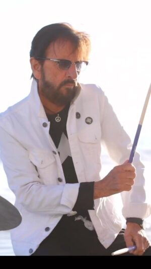 Ringo Starr Instagram - “Everyone and Everything” the new music video from Ringo premiered today to mark the 10” vinyl & blue cassette release of EP3, which is also available on CD and all streaming/download services. The song was written by @reallindaperry and the video was filmed by @kiiarens 😎✌️🌟❤️🎶🍒🥦👍🌈☮️
“I had so much fun making this record, and I love that the vinyl and this video for it are coming out as we head into Thanksgiving. As I’ve said before, every song on this EP relates to Peace and Love. And this track that Linda wrote for me has such a beautiful message, reminding us to be thankful, to be giving, to be more peace and loving. I feel we really captured the positive energy of the song in this video, it was so great working with Kii and I loved filming on the beach. I hope this brings everyone joy, peace and love as we start heading into the holidays.” - Ringo