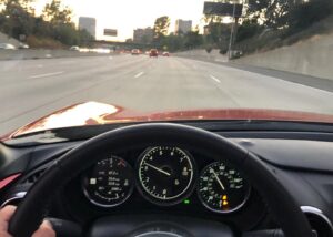 Rob Corddry Instagram - I had the pleasure of driving the shit out of Mazda’s Mx-5 RF Miata for a weekend. My only complaint was that it wasn’t fast enough to go back in time to tell my younger self that one day car companies will be loaning me cars for the weekend. And that I was on Top Gear America and thus a defacto car journalist. Young me would shit his water-resistant parachute pants.
But the MX-5 RF was plenty fast for my practical (and impractical) use. That aside, the Mazda Miata has always had a huge problem and it has nothing to do with it’s 2.0L 16 valve 4 cyl engine, or the easy, singular experience you have smacking into a corner at 70mph. It’s a quick, uniquely controllable car that welcomes the driver into its tiny cockpit. You climb in like a fighter pilot to be pleasantly hugged by the considerately fashioned interior. The car is so small and feels so small inside it’s miraculous that it manages to be so Goddamn comfortable. It surpassed the Lotus Evora in this regard, a car I can’t help comparing it to. The three-times more expensive Evora is another “fun” car I had the pleasure of beating the crap out of, but it feels cheap and creaky compared to the Miata. 
The problem the Miata can’t seem to shake is one of perception. People call its agility “go-kart handling” or in general it’s understood to be “a girls car”. I can’t decide whether or not this is an insult or a compliment to women AND/OR the Miata. Even worse, the best compliment most self conscious testers can muster is “it’s a fun car”. Even my Uncle, who had one for years, slapped a Ferrari sticker on it, fooling exactly fucking no one. Full disclosure, my uncle was a huge asshole. 
But if “fun” is derisive then bury me in this car and don’t take the smile off my face (but do give me a little blush please). And if the satisfaction of shifting the 6-speed manual is only for “girls” then let’s stick driving a Miata somewhere in between “life-expectancy” and “general intelligence” in the long list of things women have over men. This is a real car, for serious girls AND boys. So if you’re looking for a place to put that Ferrari sticker, I suggest a better idea would be “up your own ass”
#miata @mazdausa #mx5rf