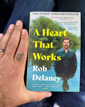 Rob Delaney Instagram - 🇬🇧UK • I’m touching the paperback of A HEART THAT WORKS for the first time! Out Thursday. Much cheaper than the big bulky hardcover. Preorder >3 copies now at the link in my bio. ❤️📚