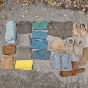Rob Greenfield Instagram - This is my complete wardrobe, 19 items.
All Natural fibers
All Naturally dyed
All Homemade

The fibers are wool, linen, cotton and deer skin. 
The clothes were naturally dyed with black walnut, indigo, weld and turmeric.
Sewed with cotton thread and deer sinew and buttons made from the branch of an avocado tree.

There is absolutely no plastic elastic, metal or rubber.
I have no pockets.

These clothes are 100% biodegradable and will do no harm in returning to Earth. Their return will be no different than a leaf falling from a tree or an animal falling to the ground. This is how I intend to return in these clothes as well.

My shoes are felted wool boots. My moccasins are deer skin with deer sinew - Ojibwe puckered toe style – with gratitude to the Anishinaabe people. I am barefoot most of the time, but these will keep my feet warm on colder days and protected when needed, while remaining connected with Earth.

My hat, neck cowl, socks and mittens were hand knitted by Dear Friends.

The shirts, pants, shorts, bag, long underwear, socks and shawl were sewn with an electric sewing machine, some by me and some by an apprentice.

Although I have liberated myself from brands, logos, fast-fashion, toxic dyes and plastics in the clothes I wear, I desire to connect to the source of my clothes more deeply.

The cotton, linen and wool long underwear were produced with organic and relatively sustainable farming practices, but involved large machinery and industry. I used mordants in the dying process that were involved in industry. I used items that my friends and I know how to source naturally and locally.

The journey continues and will deepen...

The Earth can provide us with EVERYTHING we need.
I have dedicated my life to making this universal truth, MY truth.
Because to experience something, is to truly know it... 

These clothes are one step forward in ascending the delusion of separateness with Earth.
One step forward in being a living embodiment of a Dear Friend of Earth and all our fellow creatures.

Read my extensive writing on My Journey to Natural Fiber Clothes and see photos here:
robingreenfield.org/clothes (link in bio)

Love,
Robin
#naturalfiber #naturaldye