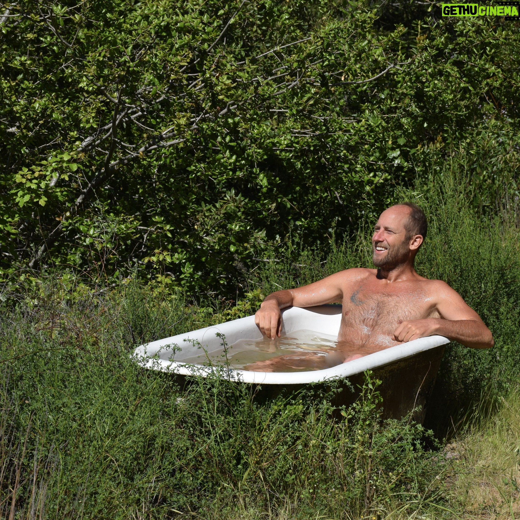 Rob Greenfield - 2.2K Likes - This is where I have been for the last week and where I will be for now.
I am here to complete my Food Freedom book. It has been a long journey and I thought I would have completed this many times already. This is the time!
I’m in the Santa Cruz Mountains of Northern California staying on the edge of an off the grid property surrounded by hundreds of acres of forest! The property is owned by a couple who found my first book in a used book store about 7 years ago and has followed me since.
This platform serves as my desk to write with a healing view of the forest.
There is a solar panel and battery on site to charge my laptop.
There is a spring with fresh drinking water, and a bathtub to fill up and take my cold dips.
I am sleeping in my tent under the trees.
I have my wild rice, dehydrated mushrooms, greens, herbs and other dry and canned food from my last year of foraging. I’m cooking over wood from the forest with my small wood stove. I am foraging the spring greens that I can find and enjoying some herbs from the garden on site.
Wifi is a 5 to 10 minute walk away at Martha and Dan’s.
My basic needs are met.
It is quite alive here with birds and insects. A small songbird landed on my head twice while I was sitting at this table writing. Hummingbirds land daily just feet from me on a branch, interacting with me. A large male turkey very clearly told me that this is his domain, not mine. The frogs have kept me company with their evening croaking and have laid eggs in my bath as well!
Some days it is a bit chilly to be writing outside but I am grateful for all the Earth provides. I have hundreds of friends here amongst the plants and animals.
This has been a nourishing and peaceful place to be after my month in Los Angeles. I have spent multiple days in silence and solitude and have had many long nights in bed, catching up on rest.
I am elated to provide Food Freedom to you in June. I would love for every one of you to have this book in your hands.
I’m offering it on a donation basis, so it is accessible to everyone, no matter their financial situation.
You are welcome to order the book now at robingreenfield.org/shop/foodfreedom
Love,
Robin