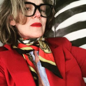 Rochelle Redfield Instagram - Friday night ‘fit after a looong week, like a ten day week. Dressing up for a Gorgeous bday celebration for a beautiful human. Thankful for my friends and community.  RED suit by @mango , (super on sale )  vintage scarf bought on an airfrance flight in the ‘80’s from #hermes , my dad’s vintage men’s dress shirt, (Thanks dad! ) Gold sequined wife-beater ( ahhh the irony!) from #zara  Hand painted #lauraashley zebra arm chair by moi. Red lip by #face {thanks #sophiaisdenim ) wrinkles by #life  None of this is sponsored, but #everyoneisdoingit .#thisis60 #menswear #suitsforever.  #imhappythisisjustmyrestingexhaustedface
