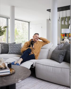 Ross Mathews Instagram - Honey, we’re home!!! 🏡 We are so proud to give a glimpse into the living room, dining room & kitchen in our New York dream home in the Summer issue of @DrewMagazine & show you how we’ve decorated with beautiful @Arhaus furniture!

The house, built in the 1970’s, is a modern oasis tucked in the woods. Flooded with natural light & views of nature through the huge windows, we wanted to keep the color palette cool, calm & contemporary. But we also wanted it to feel super-comfy. The stunning, durable & timeless designs from @Arhaus were perfect (um, hello - the couch reclines! Perfect to watch “90 Day Fiancé” on!). 

The result is a juxtaposition of nature & modern that makes @drgarciamathews & I (plus our pup Audrey) so proud to call this home ours. Pick up the latest issue of our girl @DrewBarrymore’s magazine for more pics & to read the article! And also check out the fab furniture at @Arhaus to get the look for yourself!

(Also, a huge shout out to  our extraordinary friend @dannyseomag for coordinating this project! ❤️)